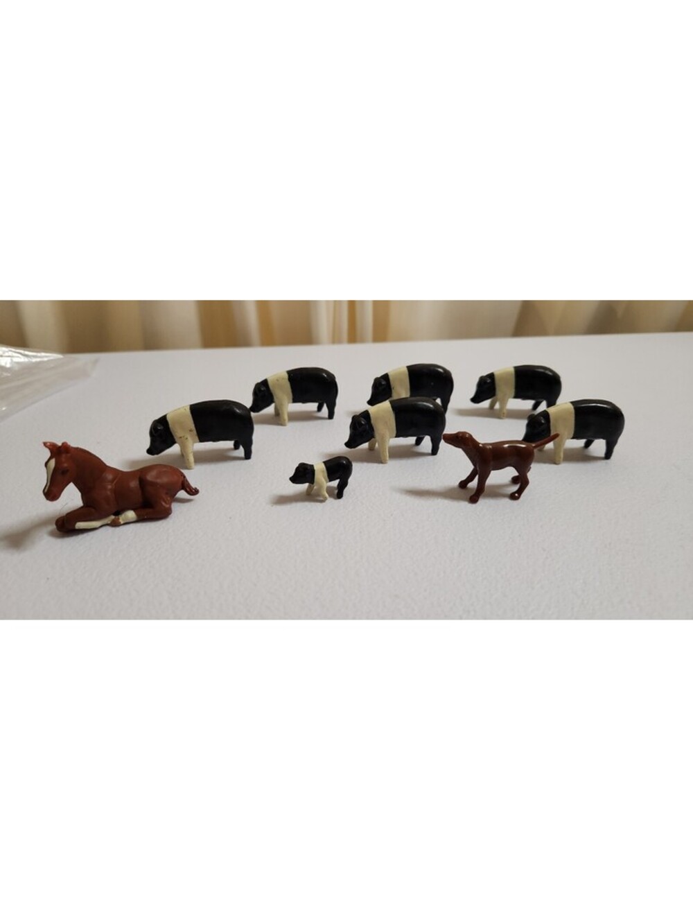 ERTL -pig figurines with horses lot
